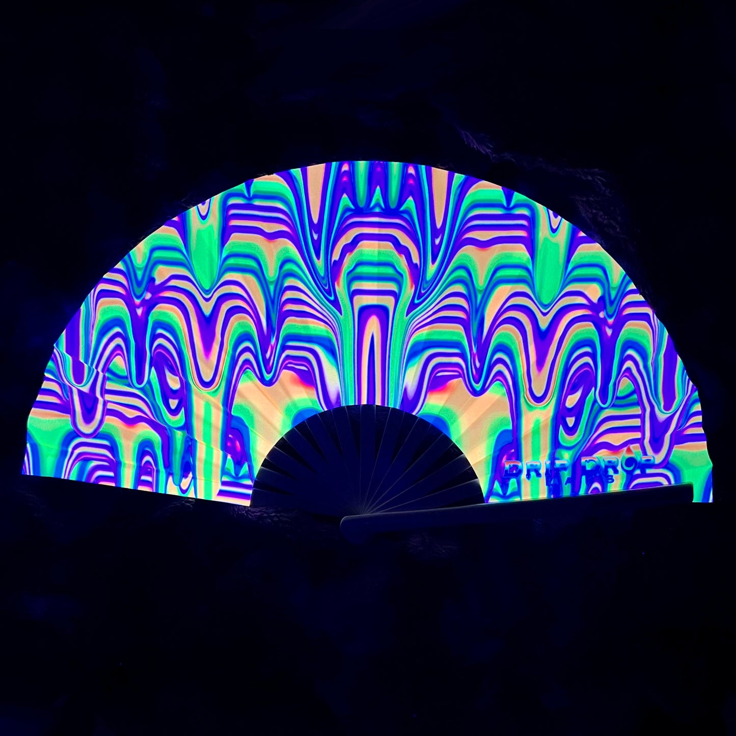 Drip Drop Labs Sunrise Drip Glow Fan displaying a colorful, illuminated fan with a vibrant sunrise design and glowing features.