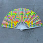 Drip Drop Labs Sunrise Drip Glow Fan displaying a colorful, illuminated fan with vibrant glow effects in a dark setting.