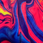 Velvet parachute pants from Drip Drop Labs in Sunset Drip color, featuring a relaxed fit and vibrant sunset-inspired design.