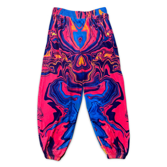 Velvet Sunset Drip Parachute Pants by Drip Drop Labs with a relaxed fit and vibrant sunset-inspired design.