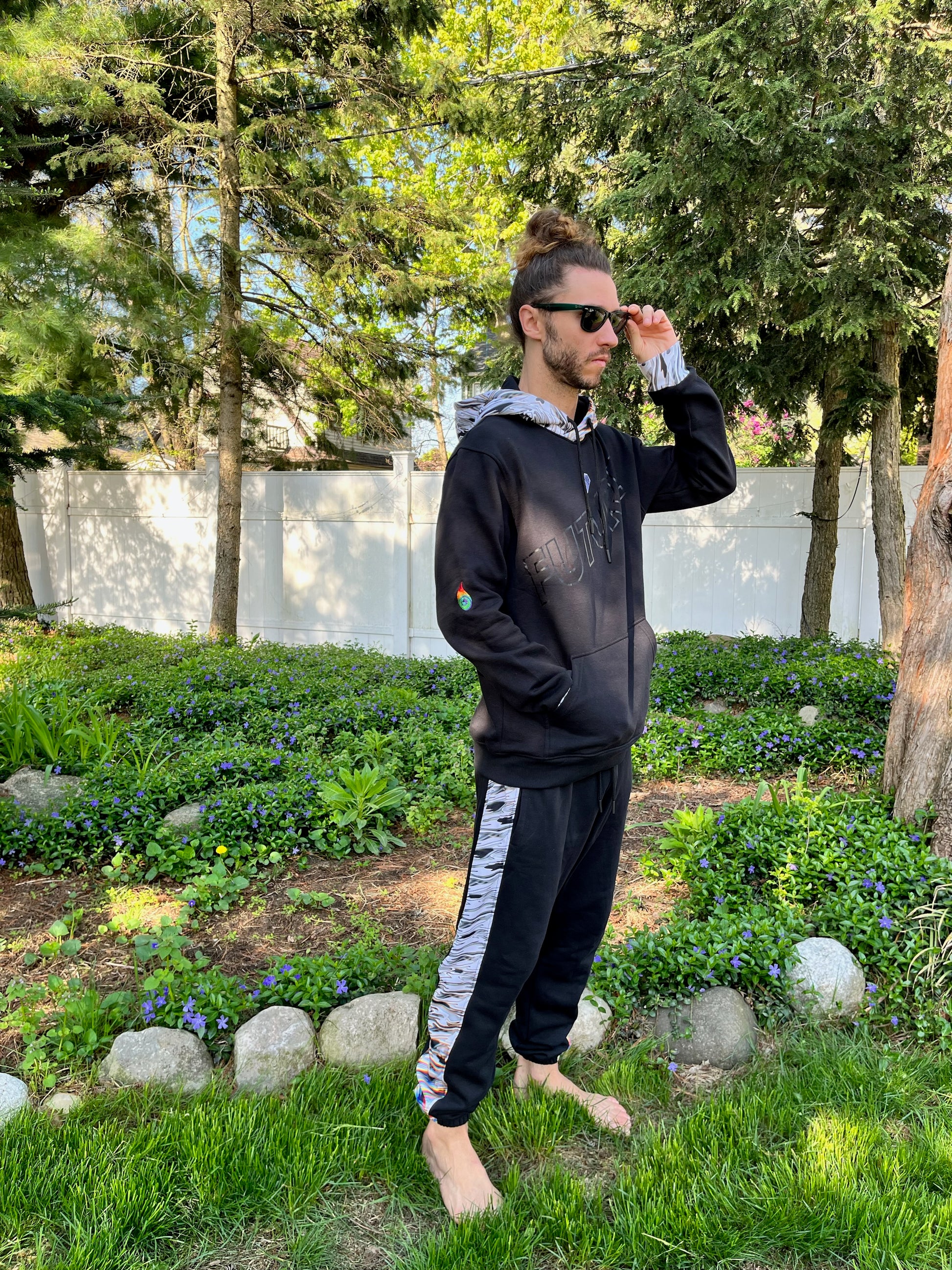 Drip Drop Labs Super Future Chromatic Athletic Hoodie in vibrant colors, showing a modern, stylish hoodie with a front pocket and hood.