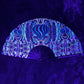 Drip Drop Labs Super Future Glow Fan displaying illuminated blades with vibrant glow effects in a dark setting.