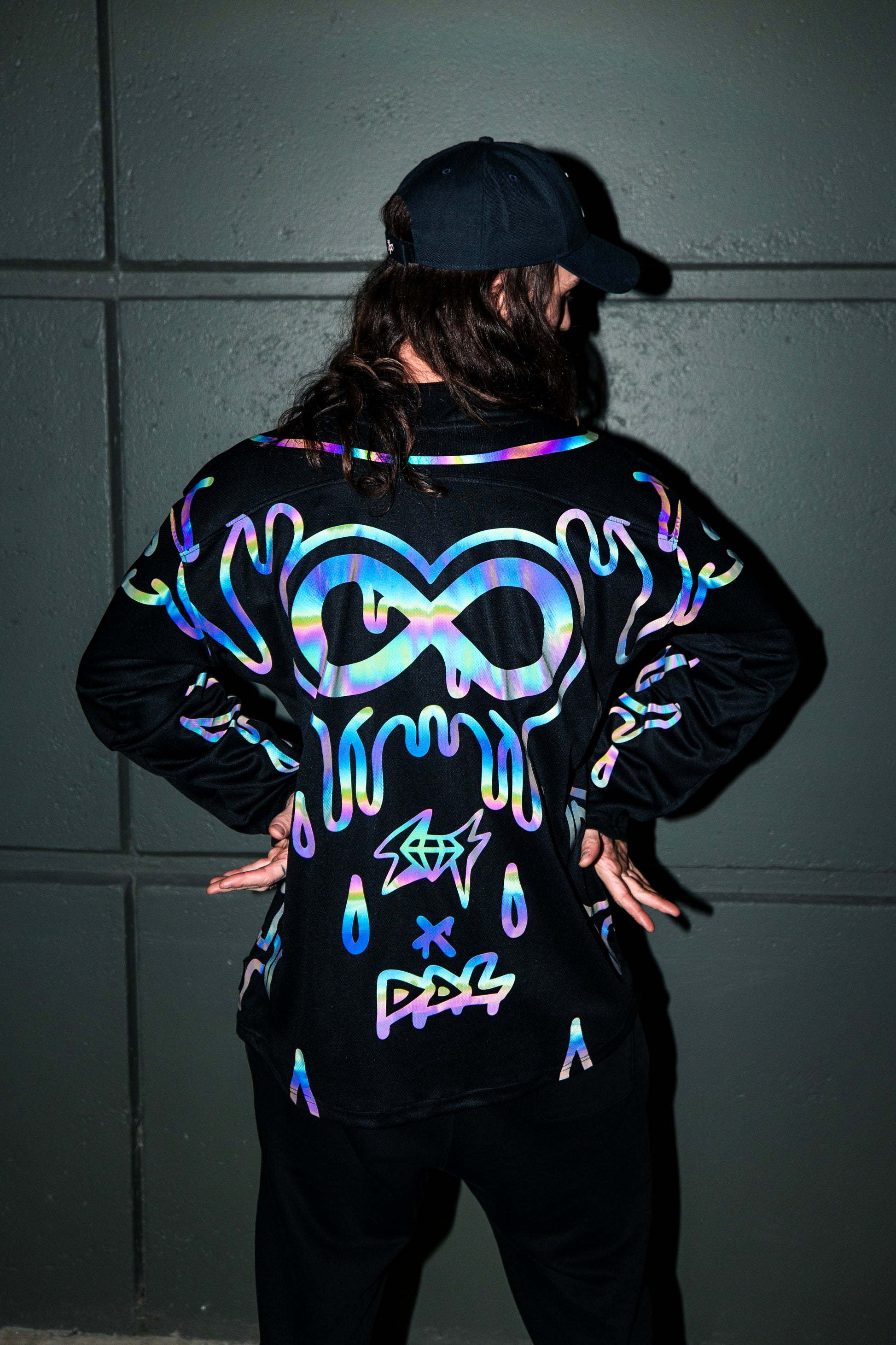 Holo hockey jersey by Drip Drop Labs featuring vibrant, iridescent holographic design and sports jersey style.