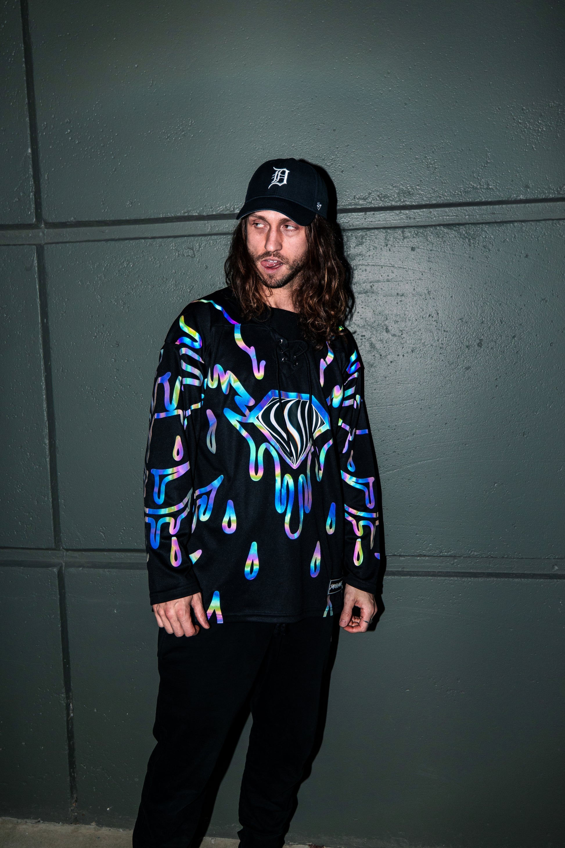 Drip Drop Labs Super Future Holo Hockey Jersey featuring vibrant holographic design and athletic fit on a mannequin.