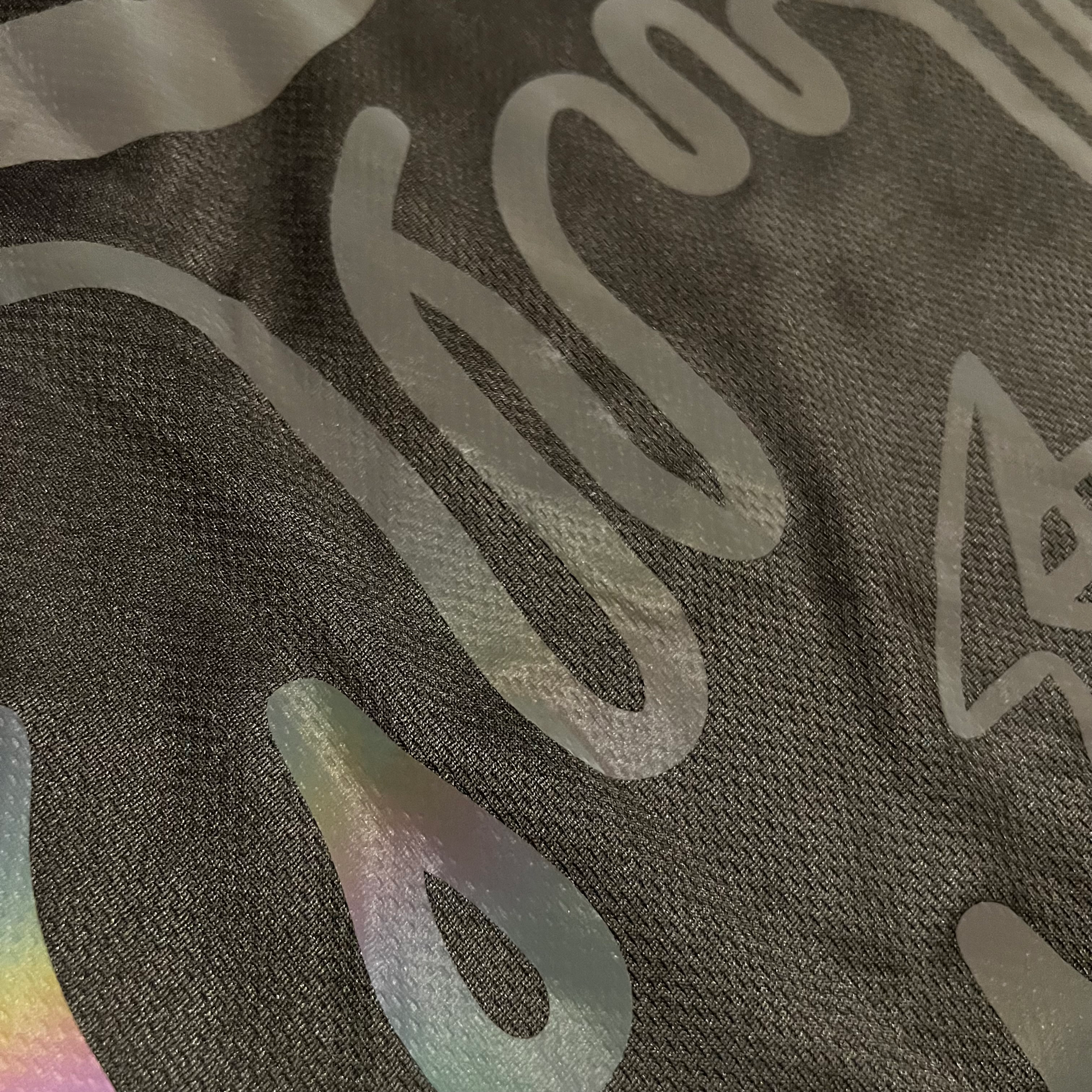 Holo hockey jersey by Drip Drop Labs featuring a shiny, holographic design and sports-style fit.