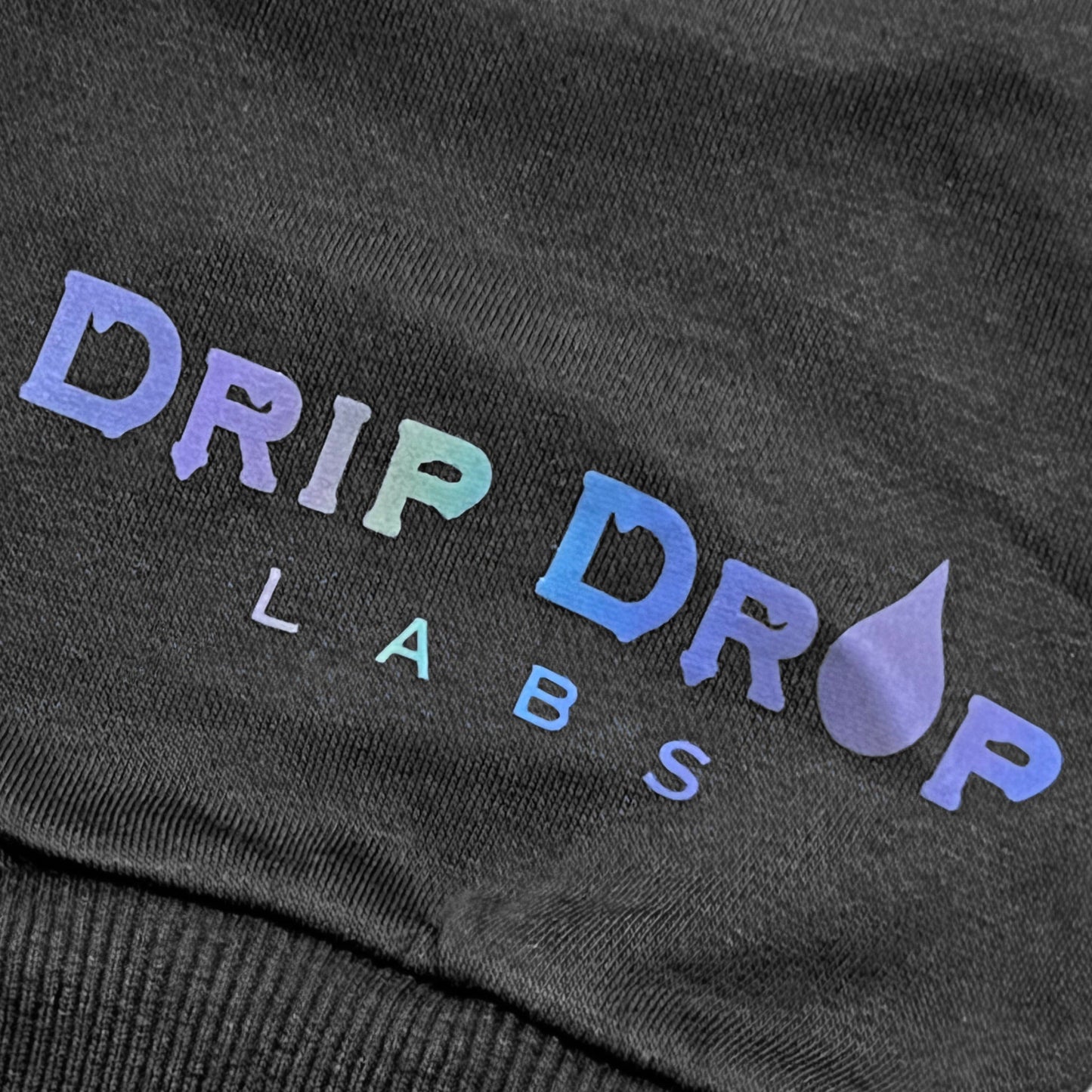 Drip Drop Labs Super Future Holo Joggers, shiny athletic joggers with holographic finish and tapered fit.