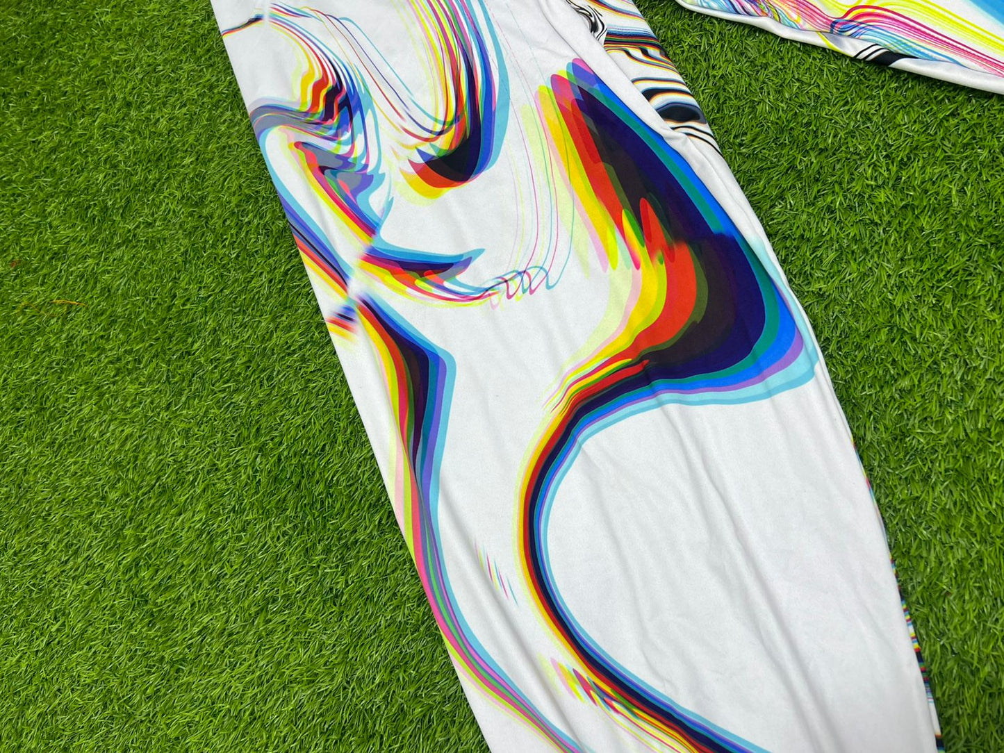 White Drip Drop Labs Super Future parachute pants with adjustable drawstrings and spacious pockets, designed for a modern streetwear look.