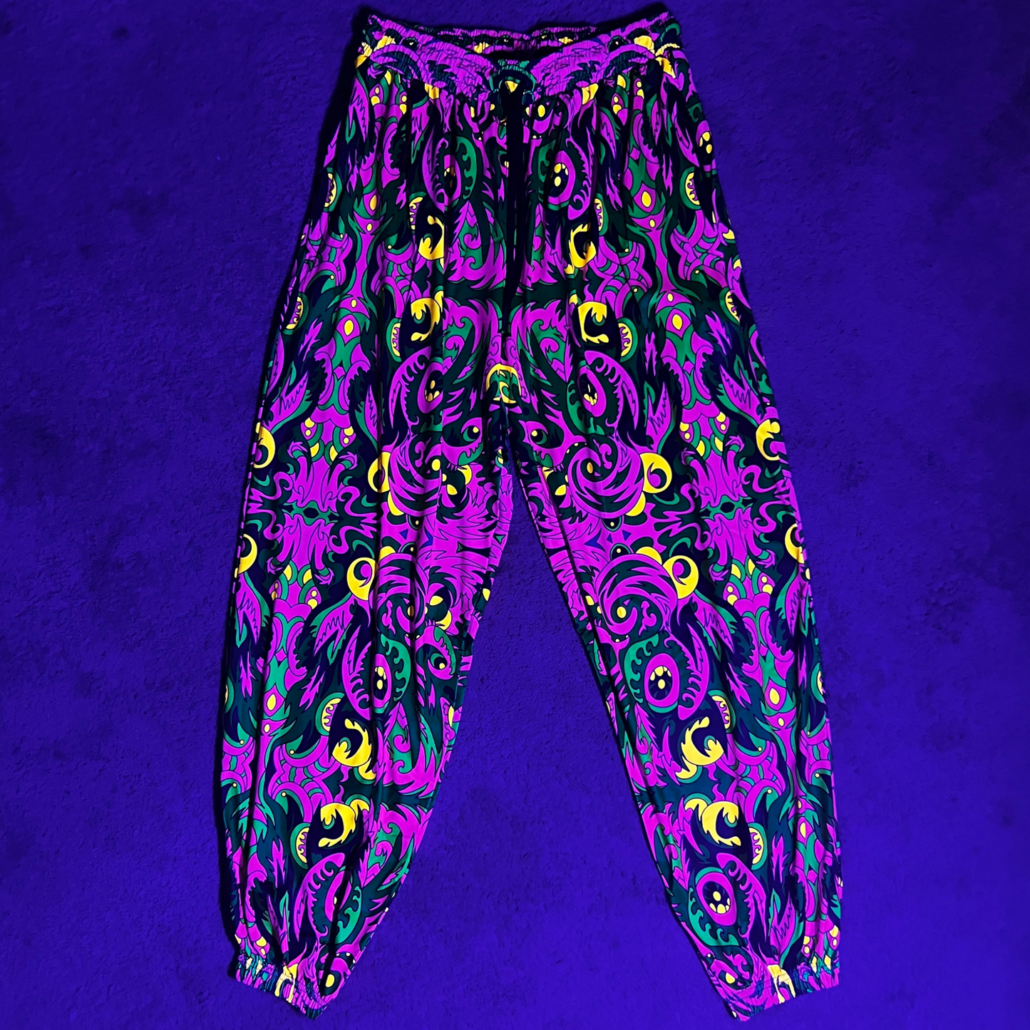 Drip Drop Labs V2 Wild Forest parachute pants with adjustable drawstrings and vibrant forest print design.