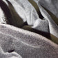 Black velvet leggings from Drip Drop Labs, featuring a soft, luxurious fabric and a snug, stretchy fit.