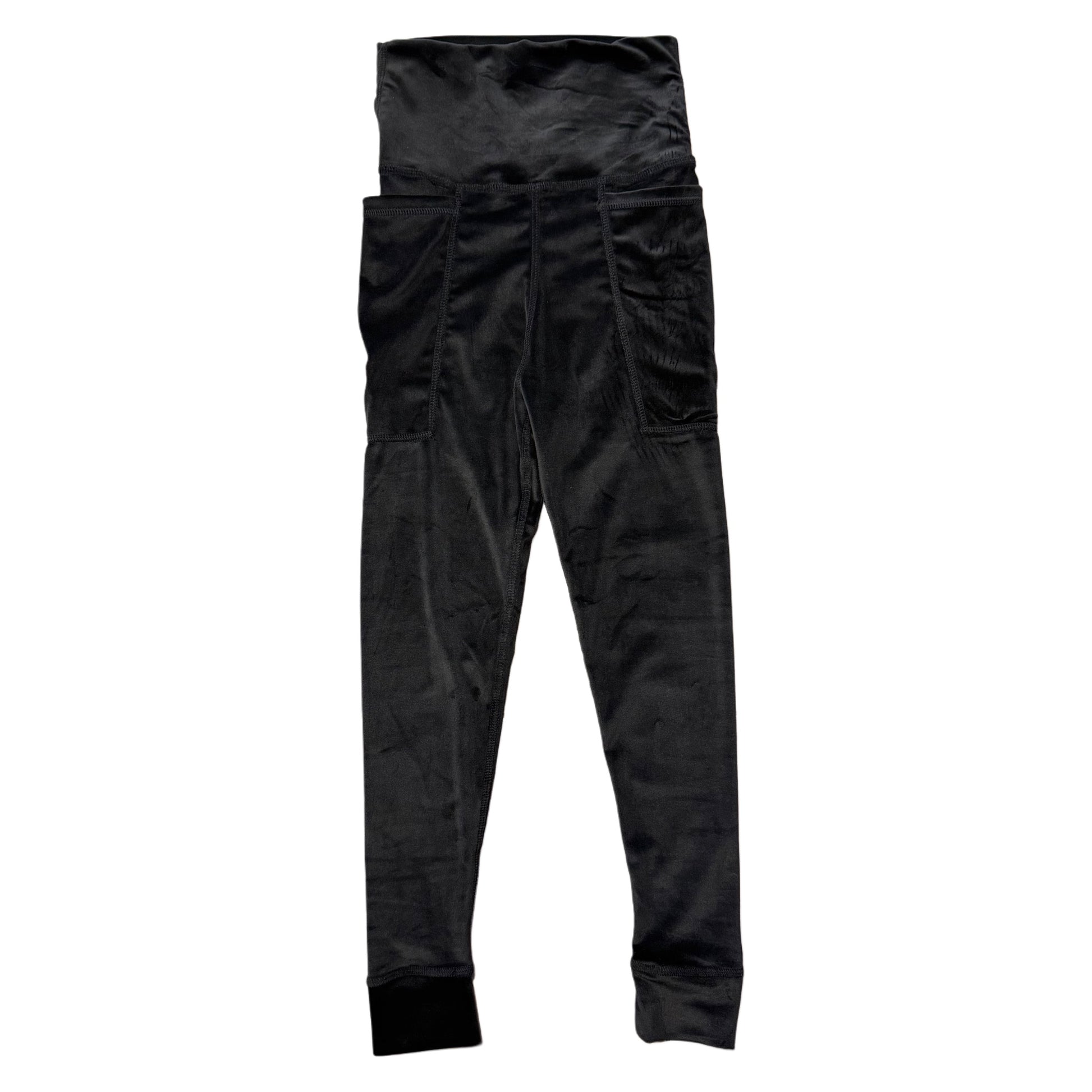 Velvet leggings by Drip Drop Labs featuring a soft, luxurious fabric in a close-up view of the stylish, fitted legwear.