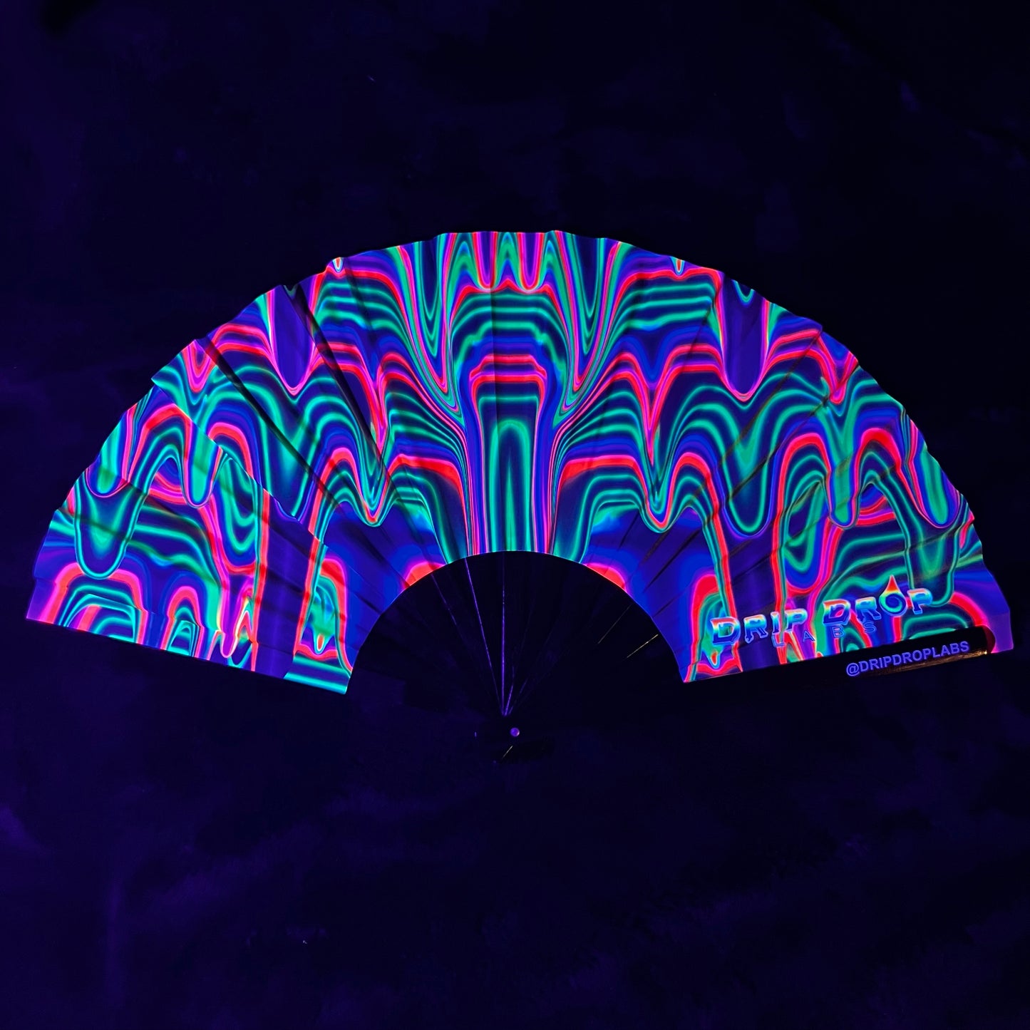 Drip Drop Labs Watermelon Drip Glow Fan showing a vibrant watermelon design and illuminated glow feature in a modern fan.