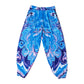Drip Drop Labs Waves parachute pants in lightweight fabric with a relaxed fit, featuring wave pattern and adjustable waist.