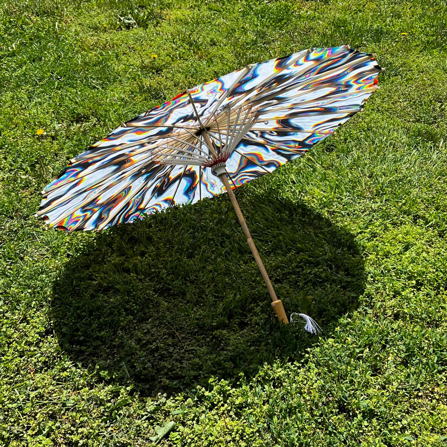 White Chromatic OG Parasol by Drip Drop Labs, stylish parasol with a sleek white design and chrome finish.