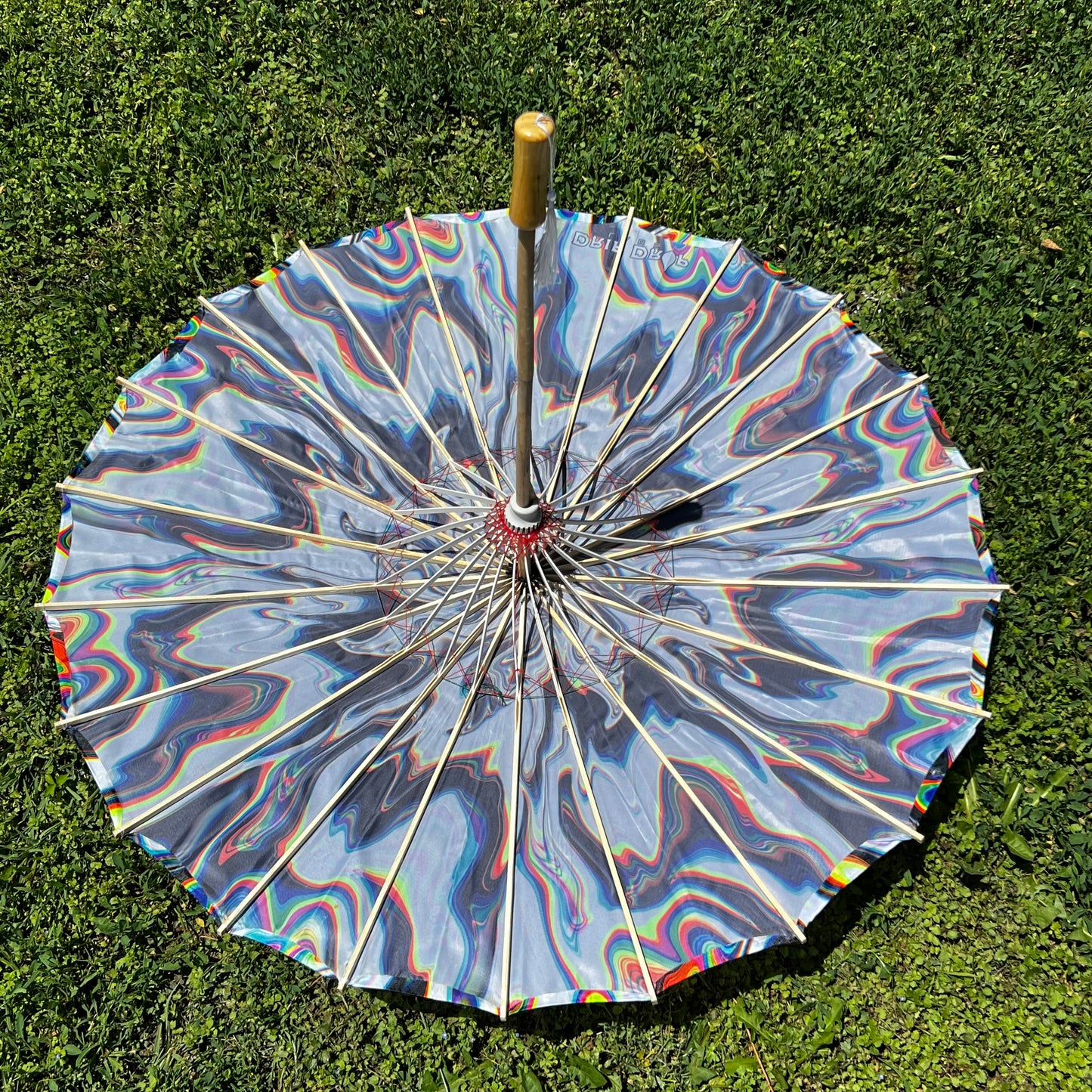 White Chromatic OG Parasol by Drip Drop Labs, stylish parasol with a sleek white design and chromatic accents.