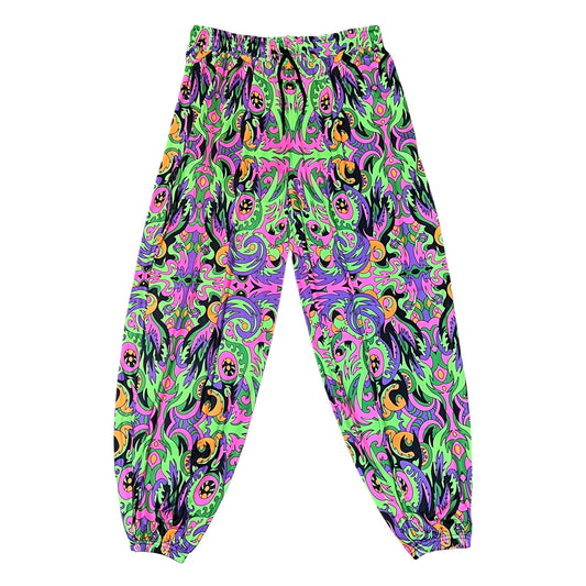 Drip Drop Labs Wild Forest parachute pants featuring a loose fit and forest-inspired print, made from lightweight parachute fabric.
