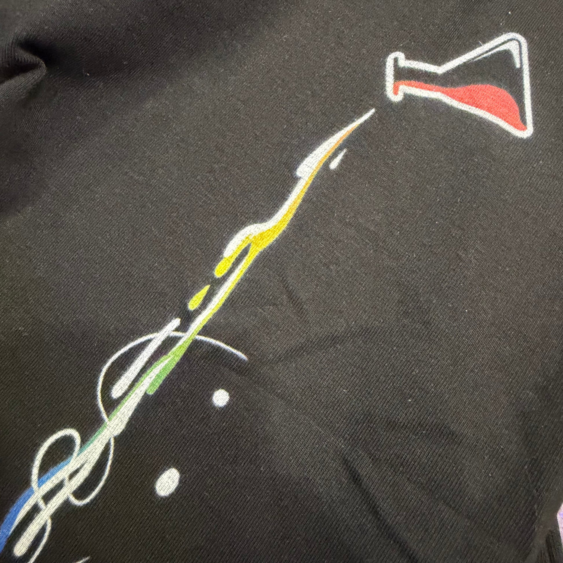 Women’s V-neck shirt by Drip Drop Labs featuring a vibrant rainbow compound design, casual and stylish for everyday wear.