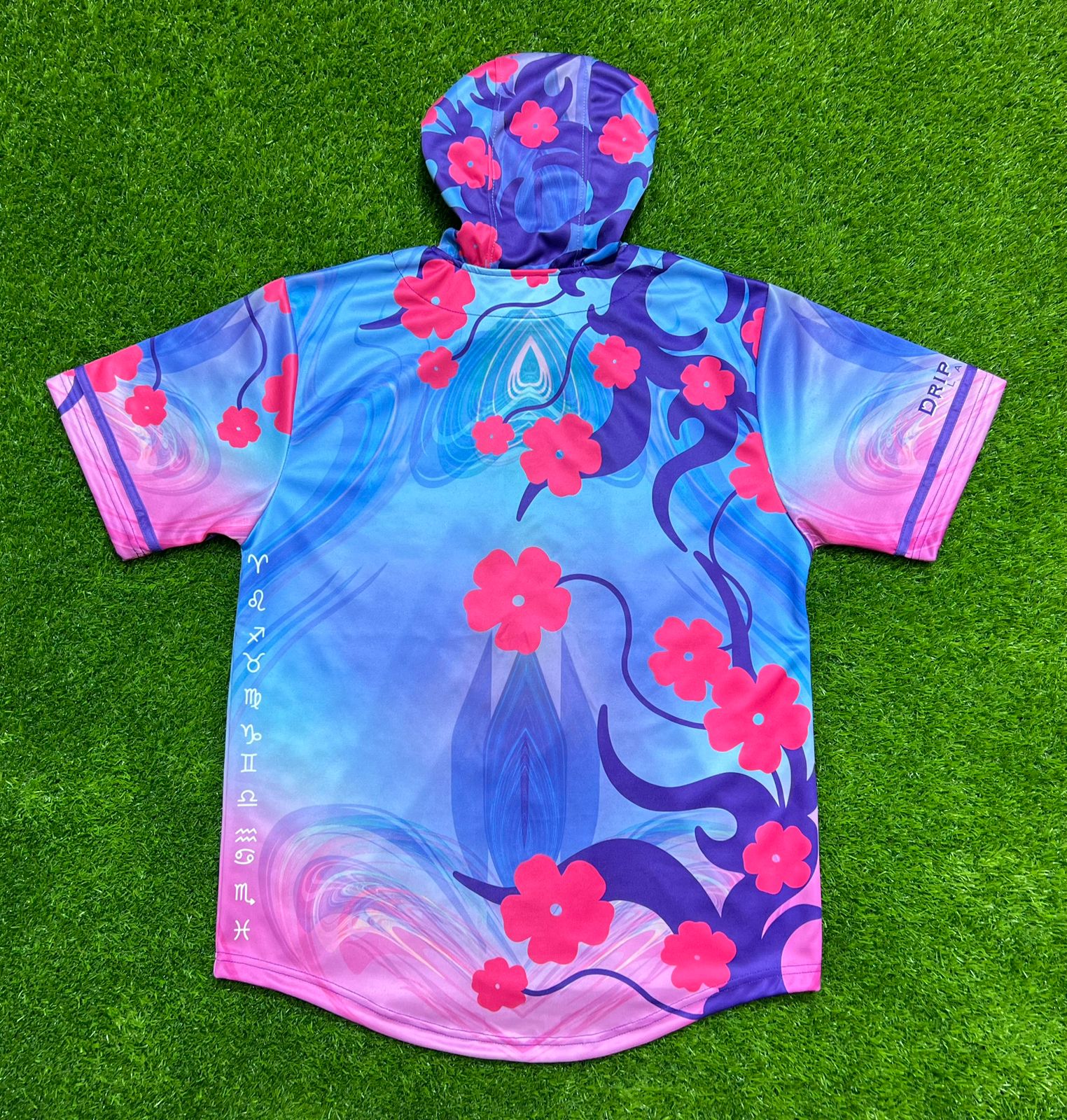 Drip Drop Labs Zodiac Flower hooded baseball jersey featuring vibrant floral design and comfortable fit.