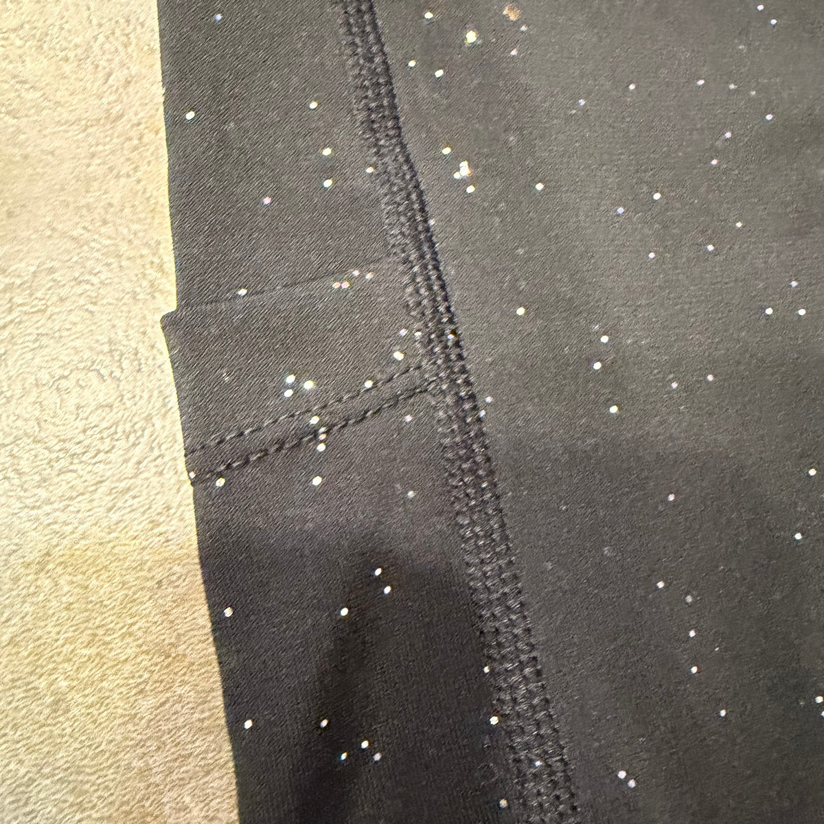 Black Galactic Leggings by Drip Drop Labs featuring cosmic star patterns and a comfortable stretchy fit.
