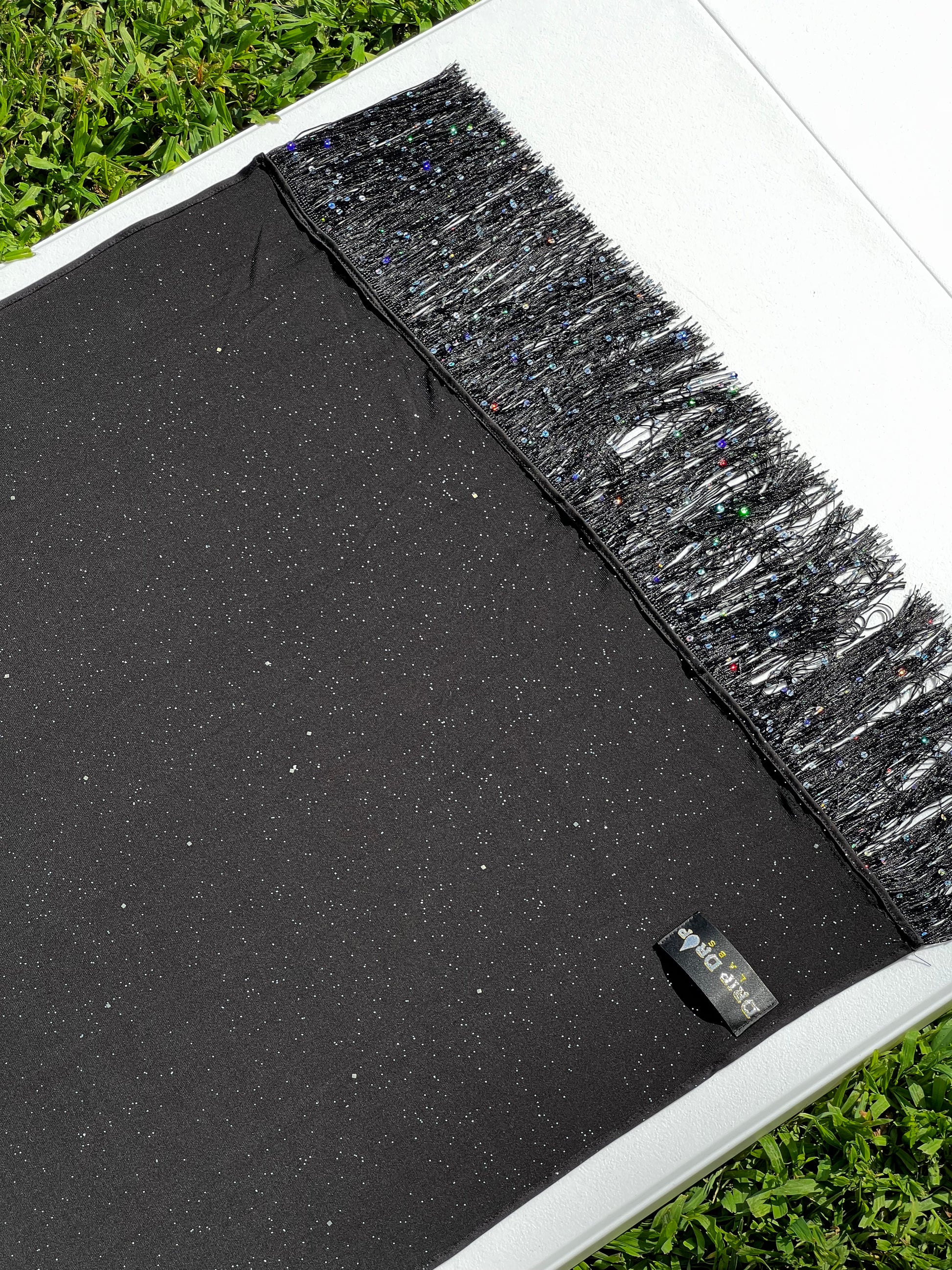 Drip Drop Labs Galactic Pashmina scarf featuring a cosmic galaxy pattern in soft, luxurious fabric.