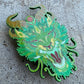 Kingdesigns26 Rock the Dragon pins featuring colorful, detailed dragon designs on metal pin backs.