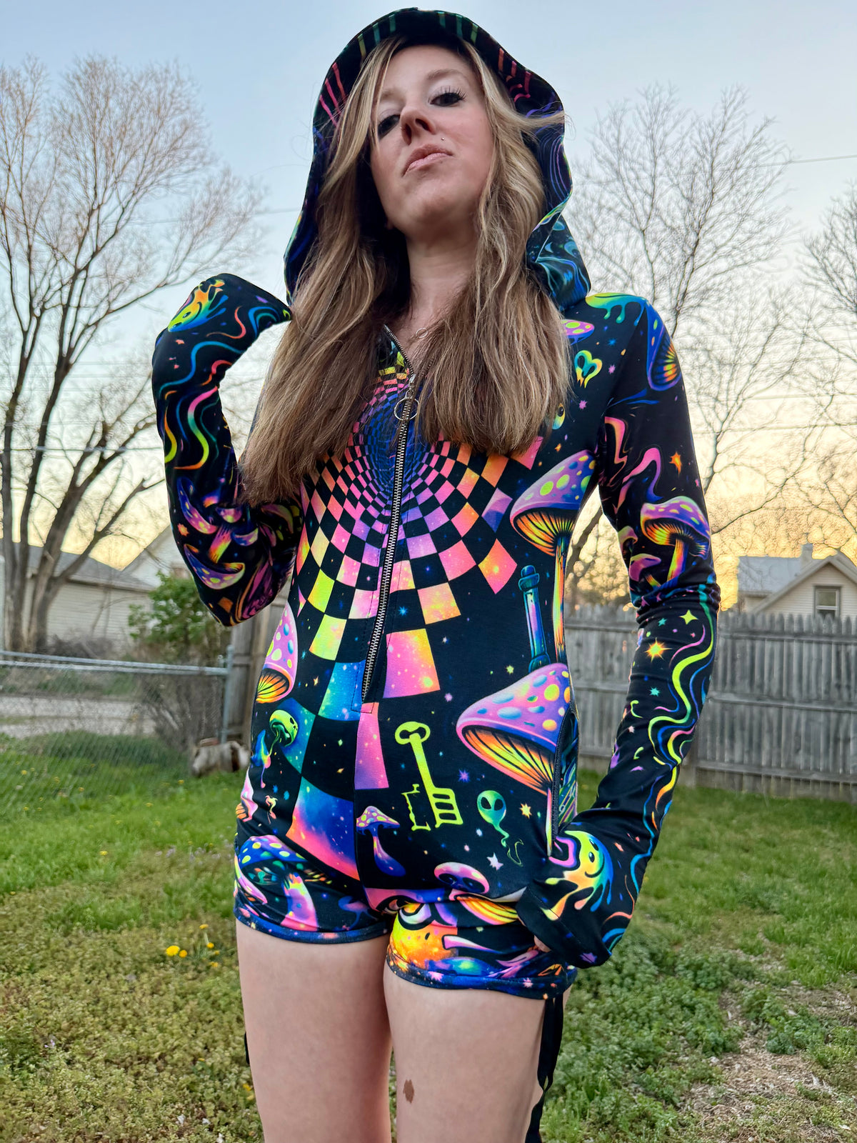 Rainbow Portal Hooded Rave Romper by Drip Drop Labs featuring a psychedelic rainbow design and hood, perfect for festival wear.