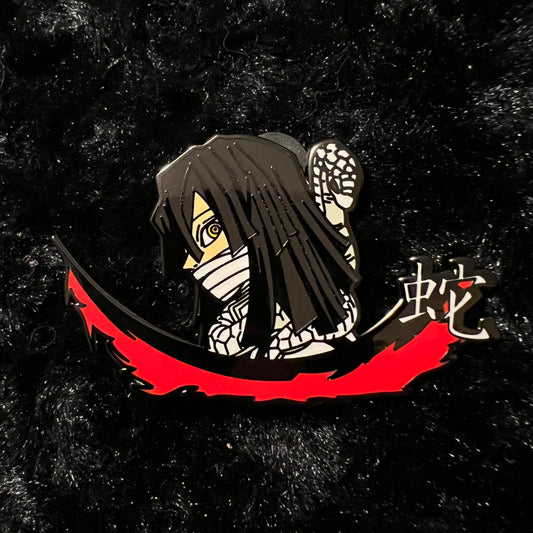 Kingdesigns26 serpent pin featuring a detailed, metallic serpent design on a decorative pin.