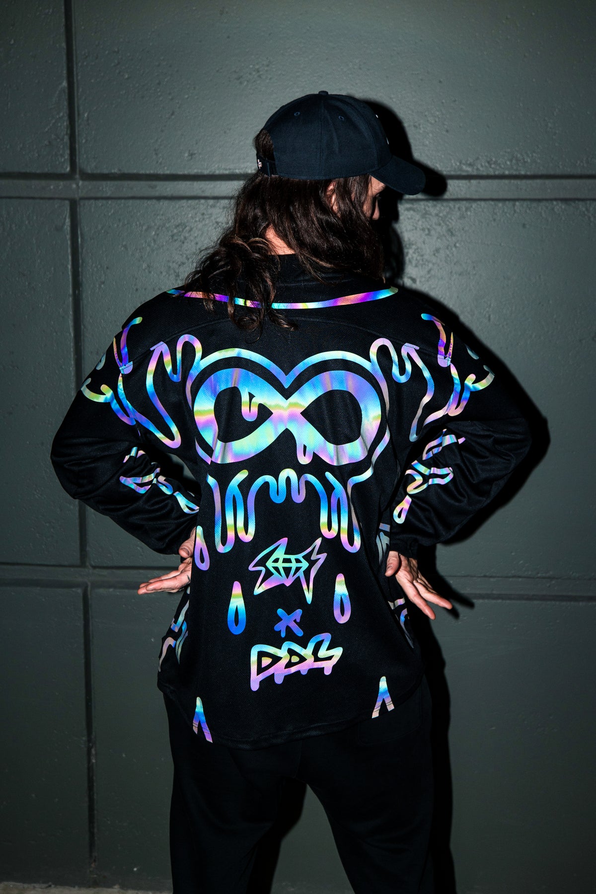 Holo hockey jersey by Drip Drop Labs featuring vibrant, iridescent holographic design and sports jersey style.