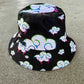 Juicy Drip Reversible Bucket Hat by Drip Drop Labs with colorful drip pattern and wide brim, casual summer hat.