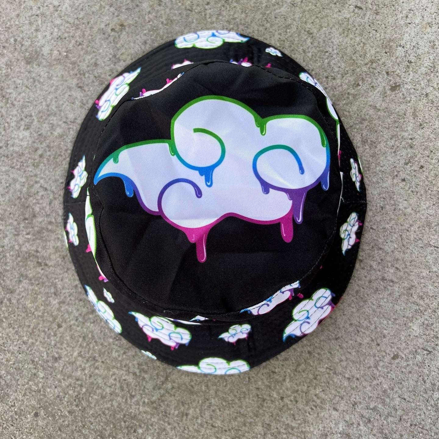 Juicy Drip Reversible Bucket Hat by Drip Drop Labs, featuring vibrant colorful patterns and a casual sun protection design.