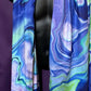Purple Drip Pashmina scarf by Drip Drop Labs, showcasing soft fabric and elegant drape in a close-up shot.