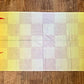 Cream-colored Renjiro Pashmina scarf by Drip Drop Labs, draped to showcase soft fabric and elegant design.