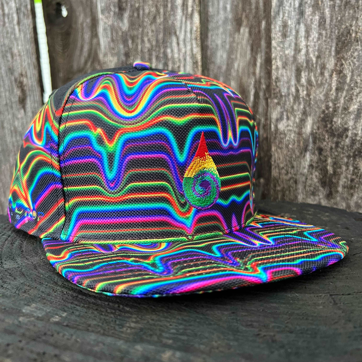 Drip Drop Labs snapback hat featuring a structured design and adjustable strap, in vibrant colors with logo embroidery.