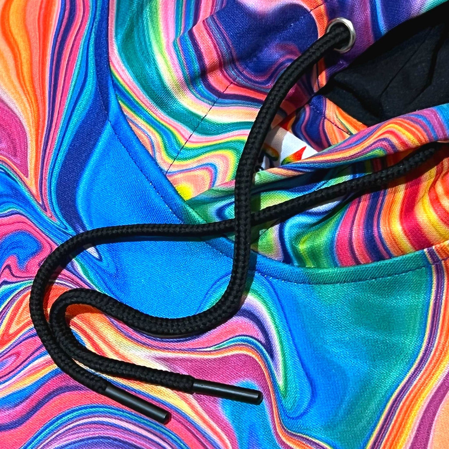 Starburst Drip athletic hoodie by Drip Drop Labs, featuring vibrant color splash design and comfortable fit for active wear.
