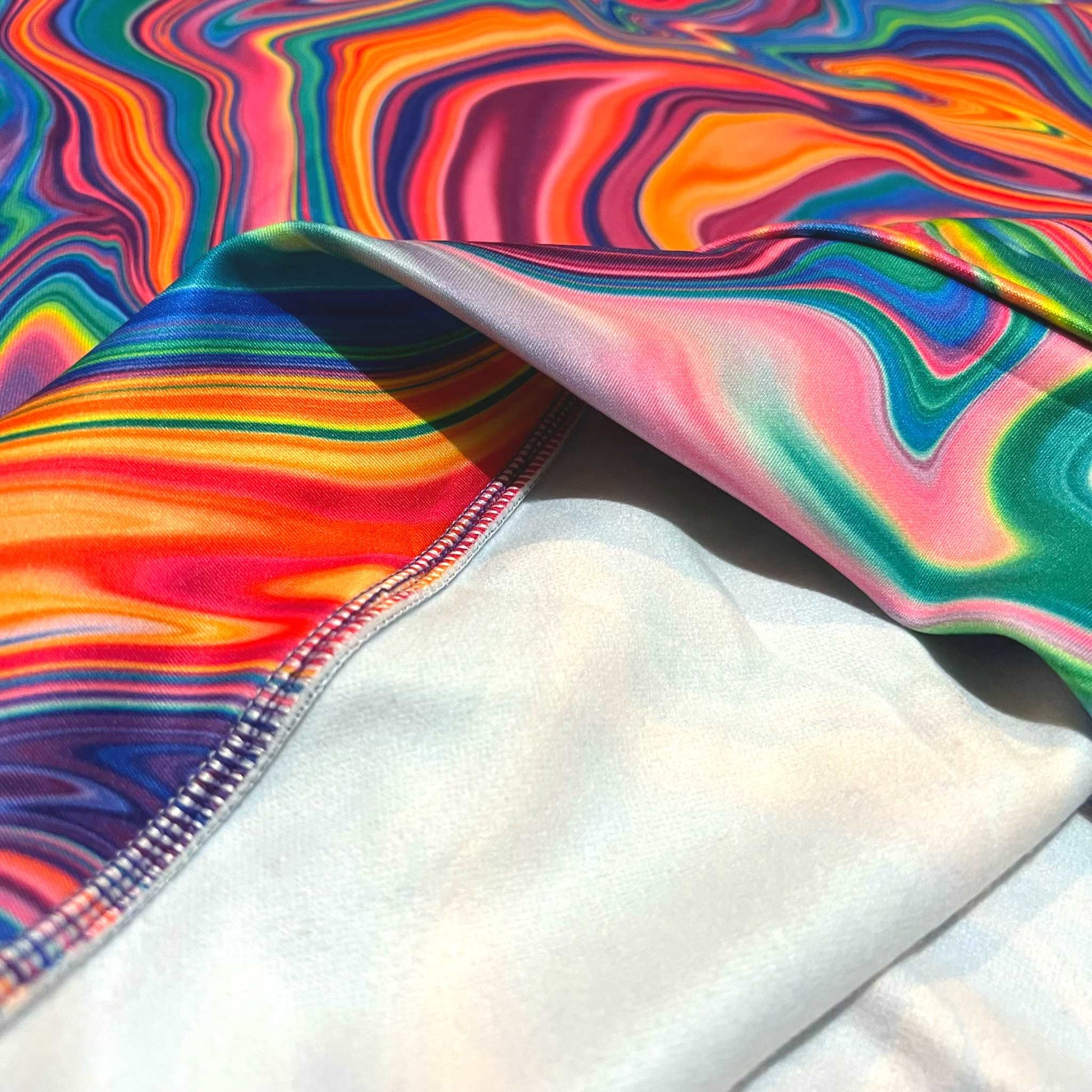 Starburst Drip athletic hoodie by Drip Drop Labs featuring vibrant, colorful drip design on a comfortable hoodie.