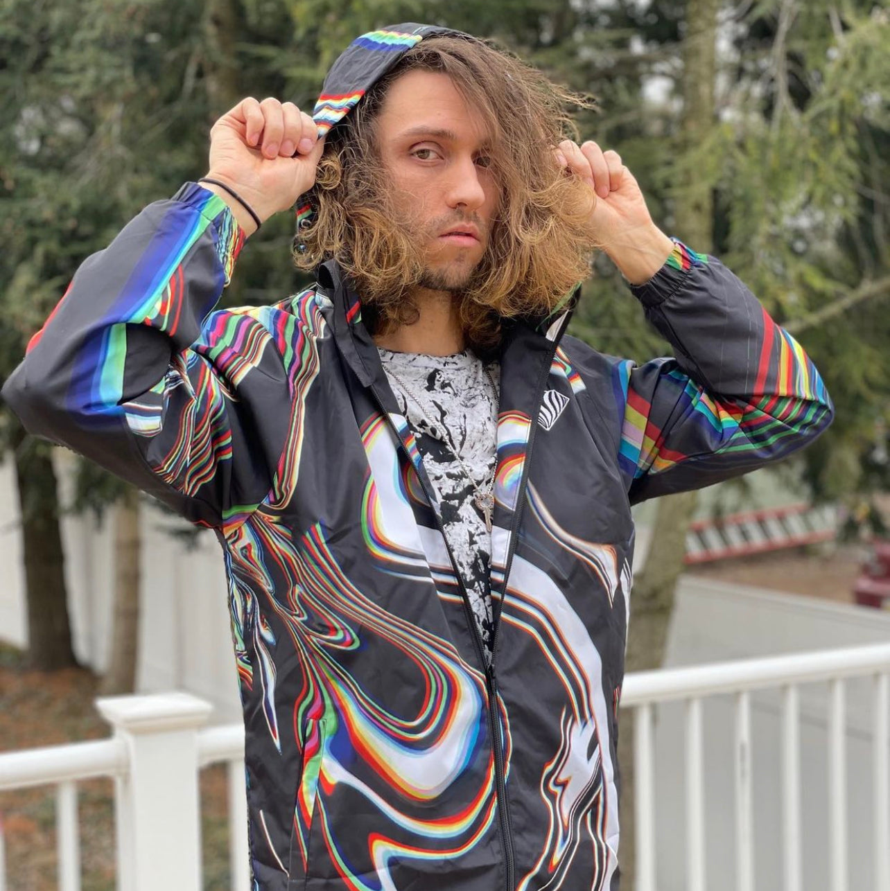Black Super Future windbreaker by Drip Drop Labs with a sleek, lightweight design and adjustable hood, shown on a mannequin.