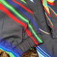 Black windbreaker jacket by Drip Drop Labs from the Super Future collection, shown with its lightweight, sleek design.