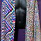 Drip Drop Labs Vibrationz Pashmina scarf featuring soft fabric with vibrant, colorful patterns and elegant drape.