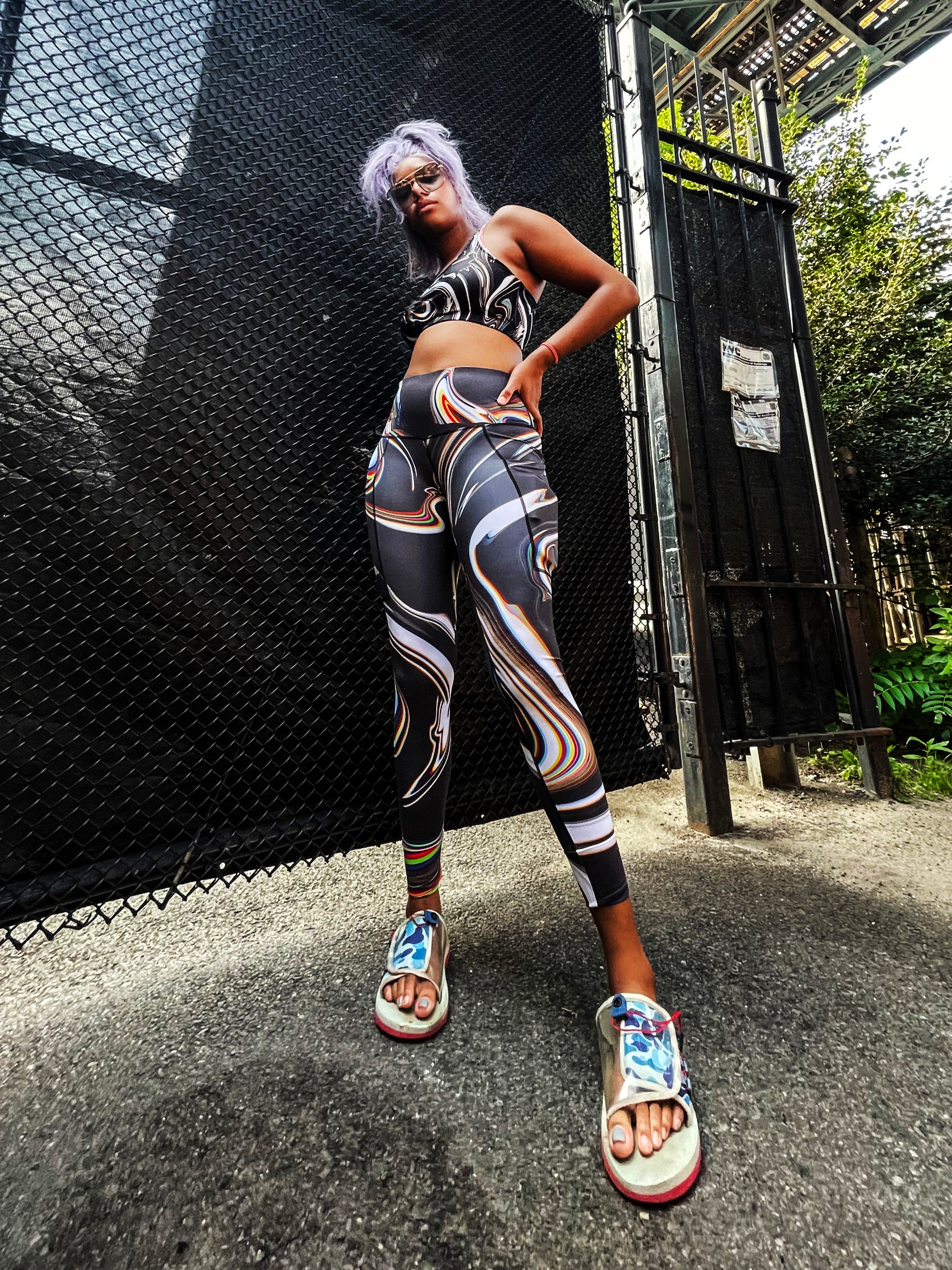 Pair of Drip Drop Labs Super Future low-waist leggings in black, showcasing a snug fit and sleek design for activewear.