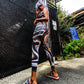 Black low-waist Super Future leggings by Drip Drop Labs, made from stretchy fabric with sleek design and subtle branding.