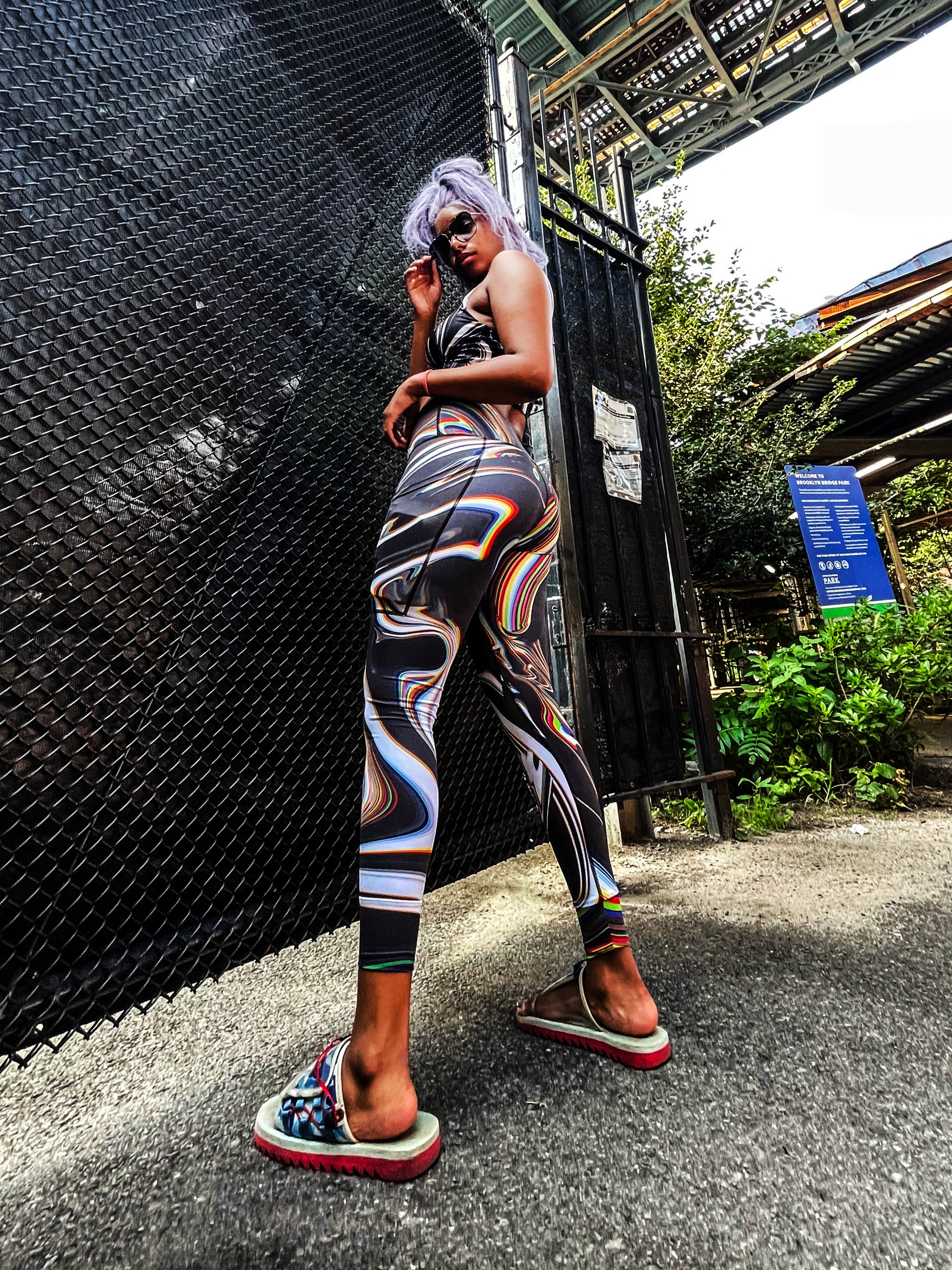 Black low-waist Super Future leggings by Drip Drop Labs, made from stretchy fabric with sleek design and subtle branding.