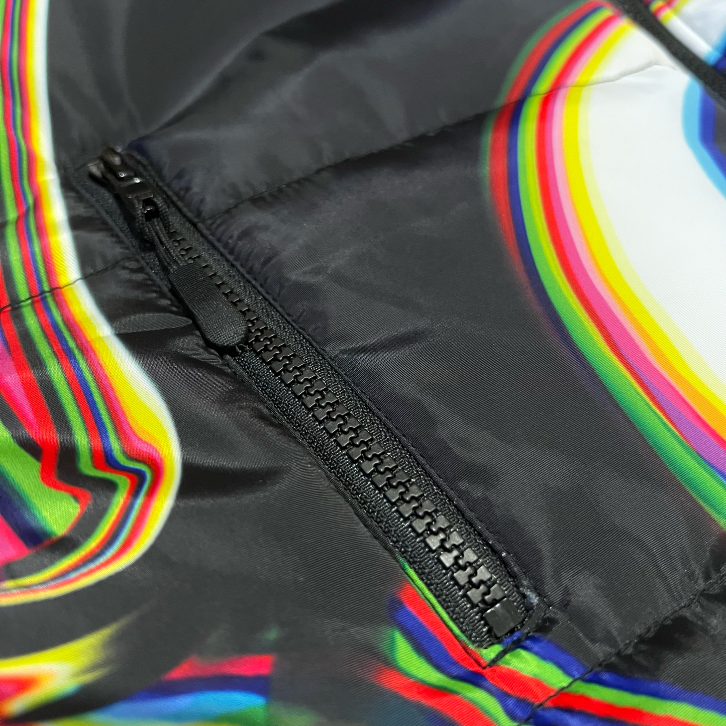 Drip Drop Labs Super Future black winter coat, front view showing the stylish winter outerwear with a sleek design.