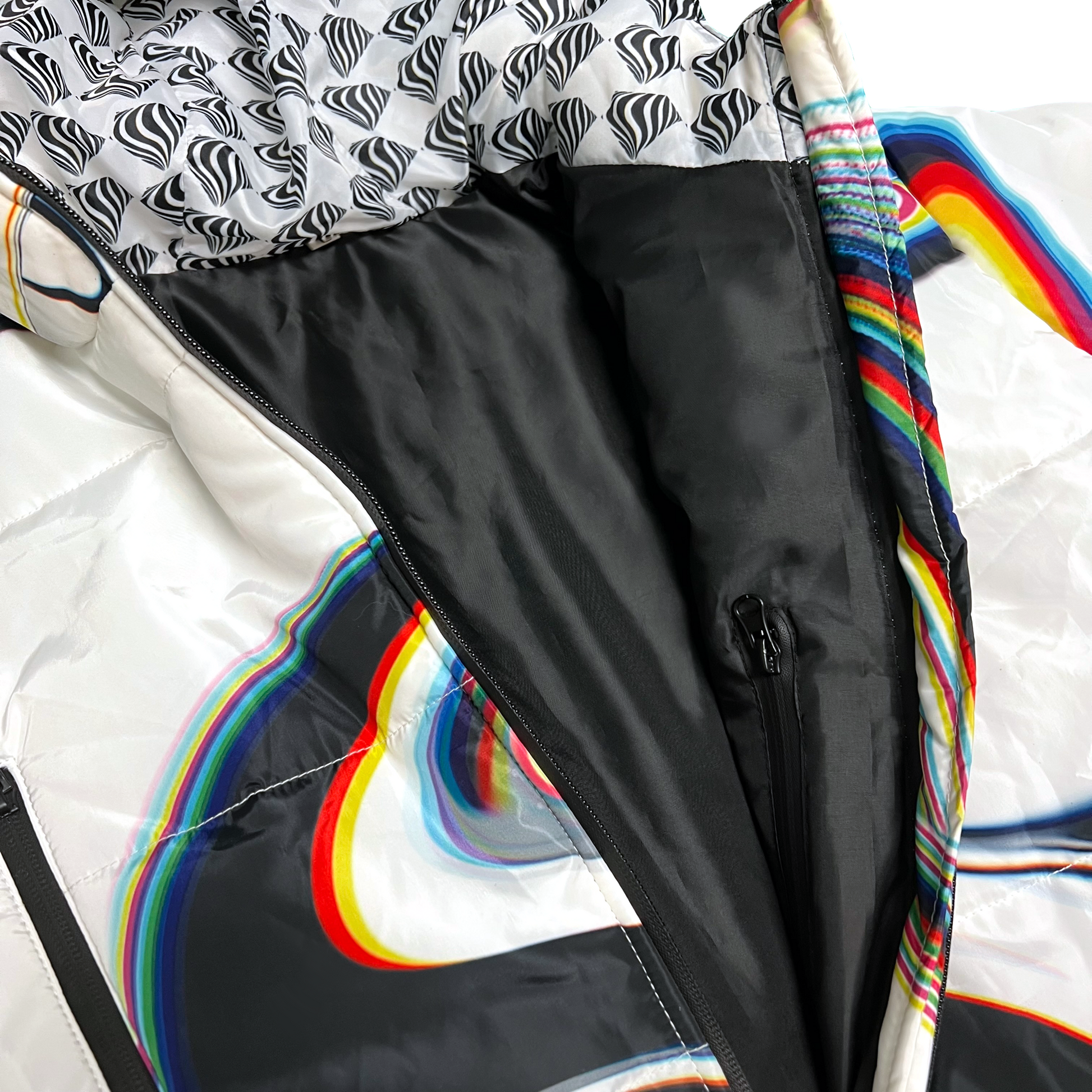 White winter coat by Drip Drop Labs, Super Future collection, featuring a stylish, insulated coat with a modern design.