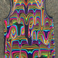 Electric Goo basketball jersey by Drip Drop Labs featuring vibrant colors and athletic fit, displayed on a hanger.