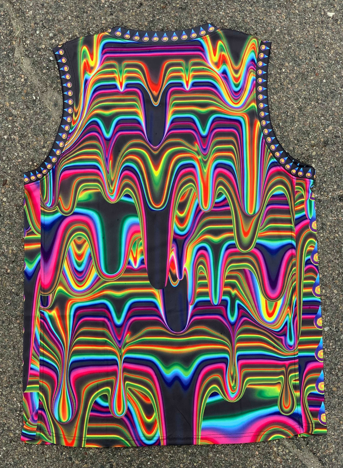 Electric Goo basketball jersey by Drip Drop Labs featuring vibrant colors and athletic fit, displayed on a hanger.