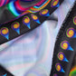 Electric Goo basketball jersey by Drip Drop Labs, featuring vibrant colors and athletic fit, displayed on a hanger.
