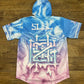 Drip Drop Labs GrizDrip v5 hooded baseball jersey featuring a stylish design and comfortable fit, displayed on a hanger.