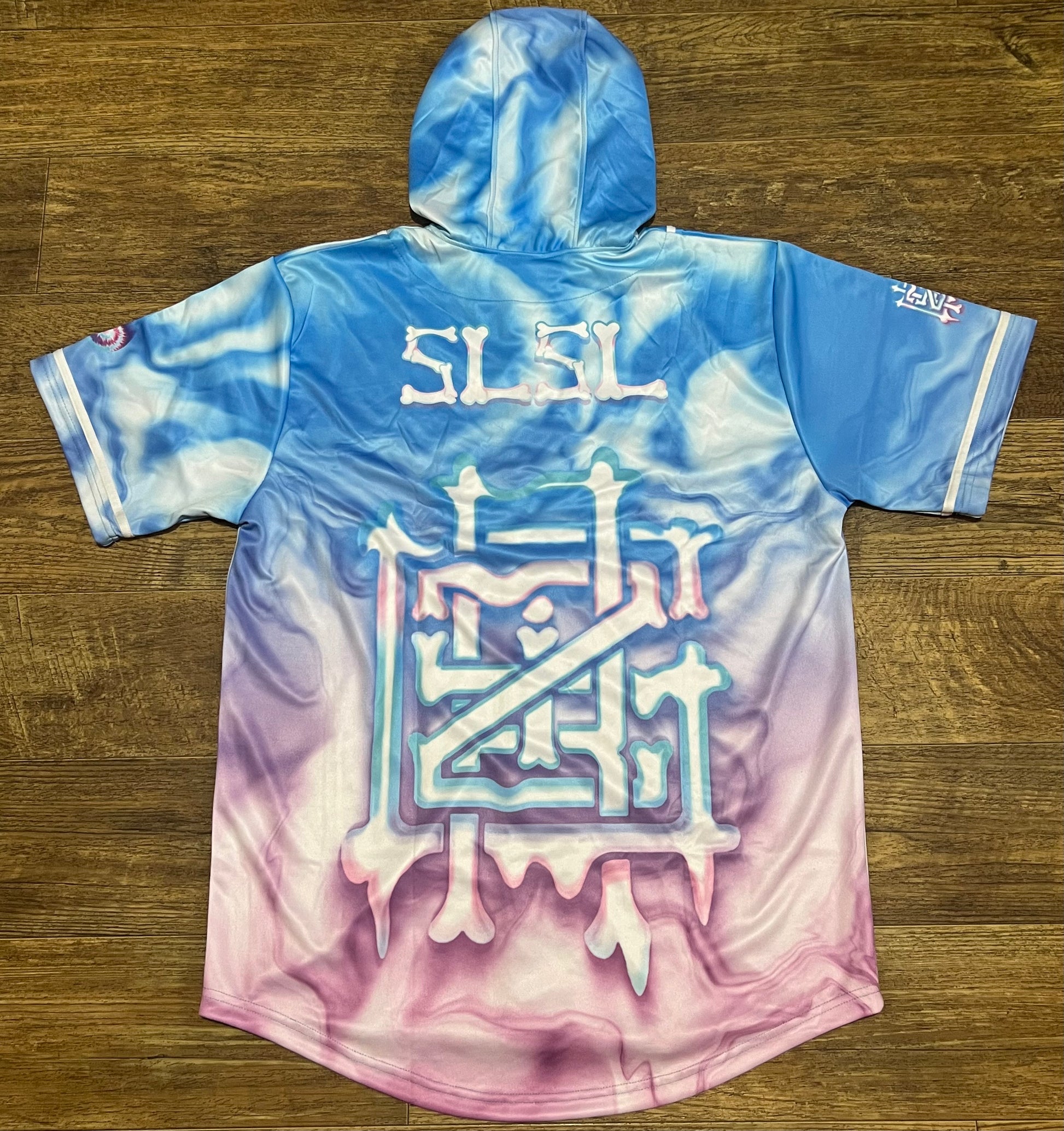 Drip Drop Labs GrizDrip v5 hooded baseball jersey featuring a stylish design and comfortable fit, displayed on a hanger.