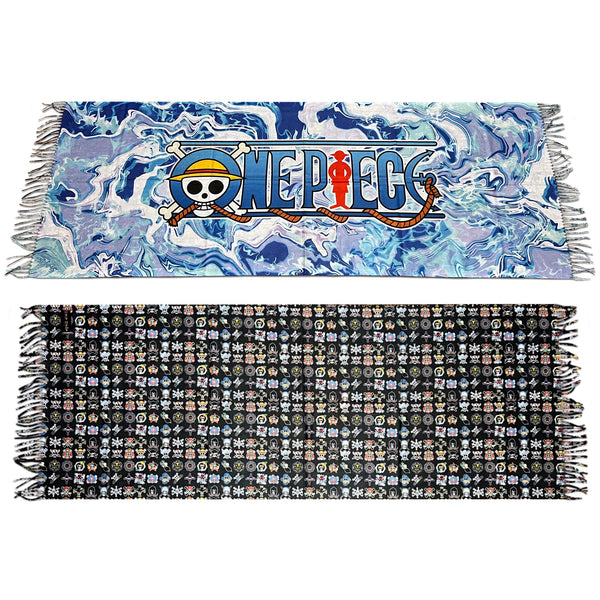 A reversible pashmina with one side featuring a 'One Piece' anime-themed pattern and the other side in a black and white grid pattern, both with tassels.