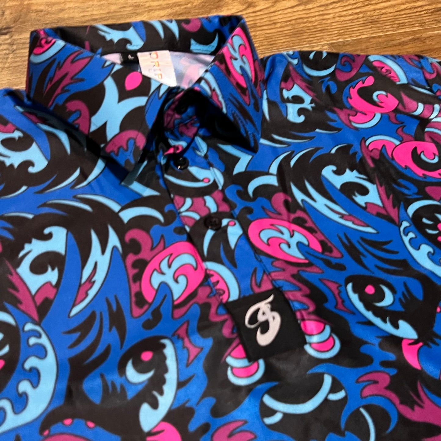 Drip Drop Labs Midnight Forest UV Polo featuring a dark forest-themed design on a classic polo shirt.
