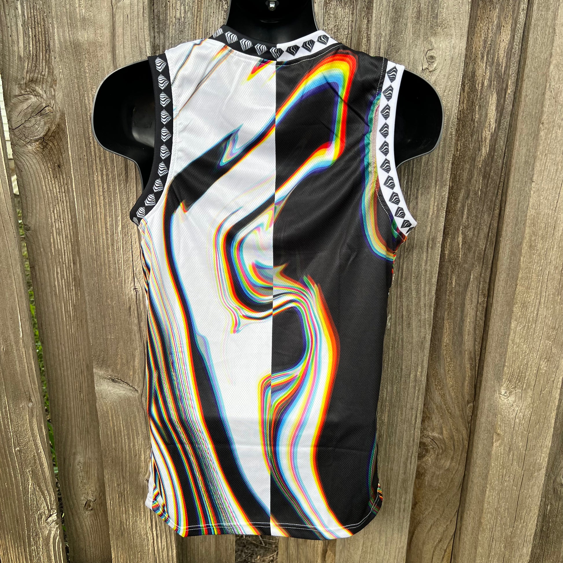 Drip Drop Labs Super Future basketball jersey with a split look, featuring bold team graphics and vibrant colors.